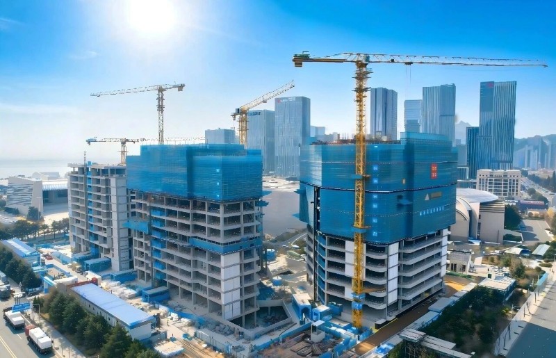 Comemore grandiosamente a conclusão bem-sucedida da estrutura central do Centro de Inovação Financeira Qingdao Fortune
